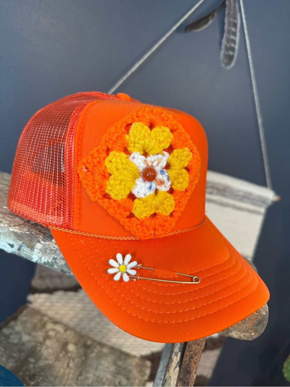 OTTO Orange Trucker Hat with Crochet Flower Granny Square and Daisy Pin